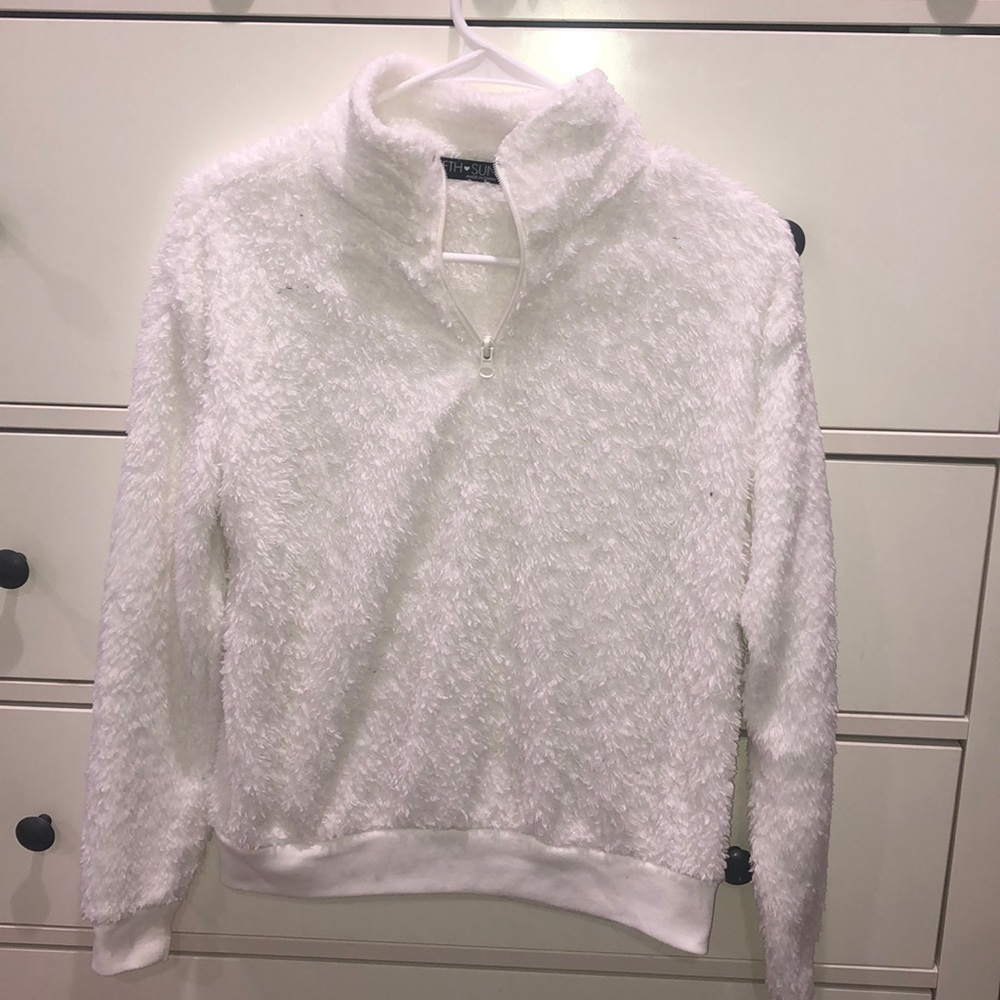 white fluffy sweater